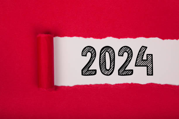 istock Torn Paper With Happy New Year 2024 On White Background 1863418367