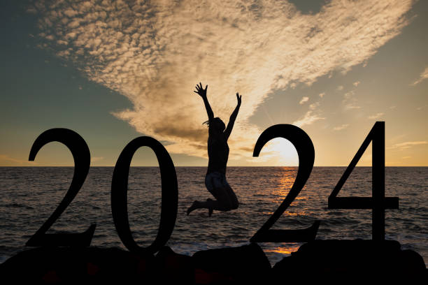 istock Woman enjoying and 2024 years while celebrating new year 1863419448
