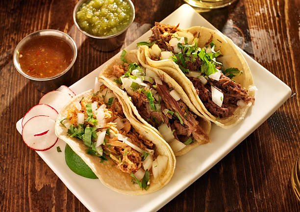 istock Authentic Mexican barbacoa, carnitas, and chicken tacos 186343062