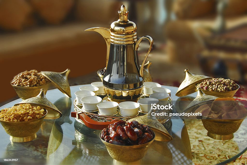 arabic coffee or tea party Arabic tea with dried dates, dried mango, nuts and sweets Arabic Style Stock Photo