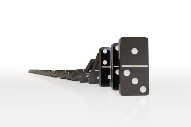 istock Black domino pieces falling in chain reaction. 3D illustration. 1863439975