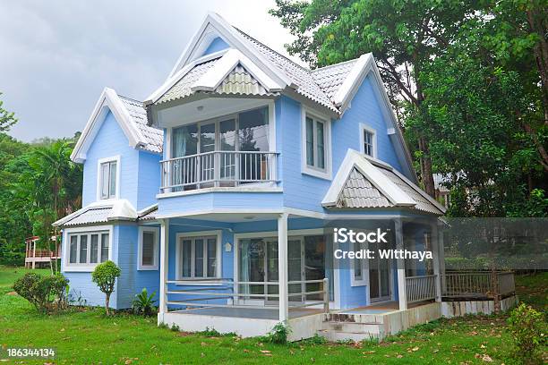 Blue House In Forest Stock Photo - Download Image Now - Architecture, Beauty, Blue