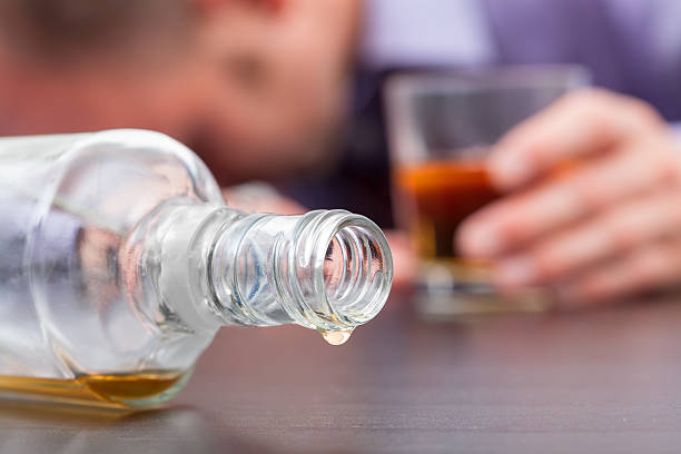 Uncontrolled consumption of alcohol Uncontrolled consumption of alcohol - alcoholizm disease alcohol abuse photos stock pictures, royalty-free photos & images