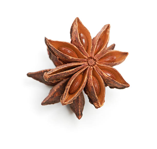istock two whole star anise isolated on white background 186346338