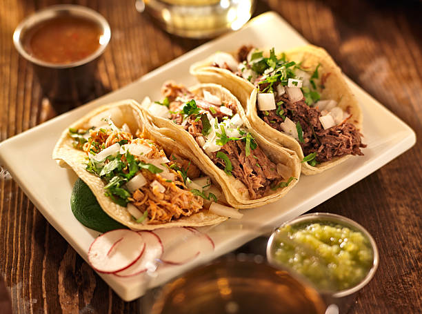 authentic mexican barbacoa, carnitas and chicken tacos