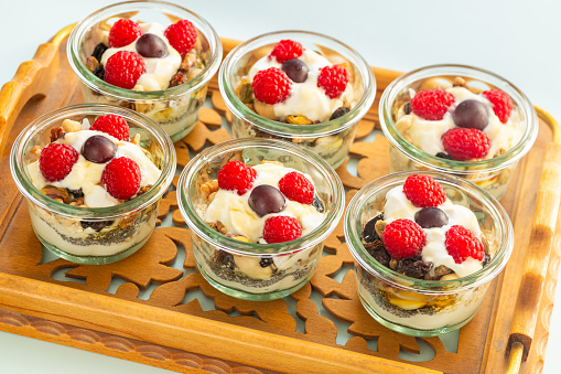 homemade dessert with delicious organic country yogurt, nuts and fruit from your own garden, Healthy food  handmade dessert