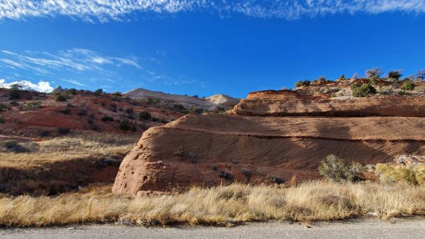 istock Stunning Red Rock Mountainside with Swirls 1863486188