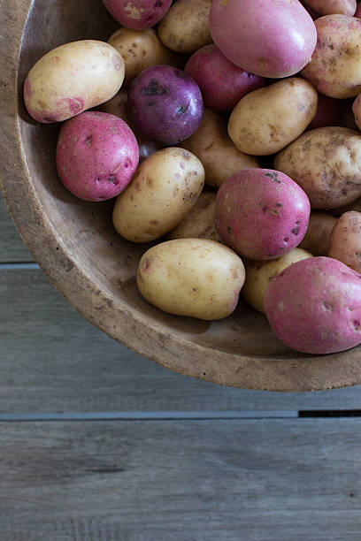 istock Fresh and unpeeled potatoes 2 186348682