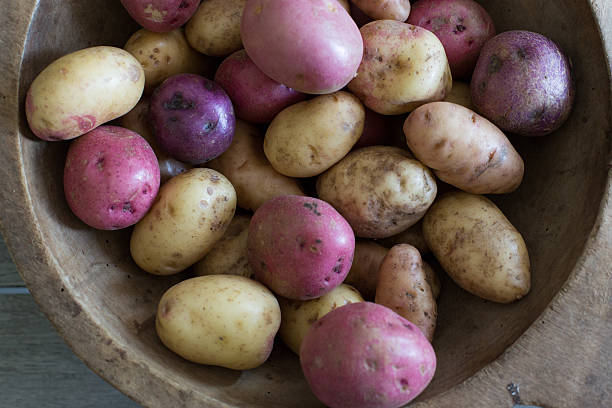 istock Fresh and unpeeled potatoes 186348683