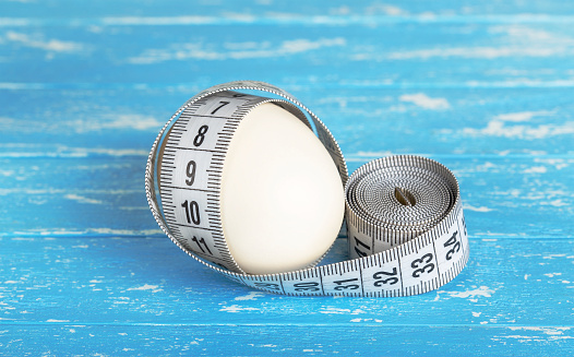raw chicken egg and measuring tape weight loss diet