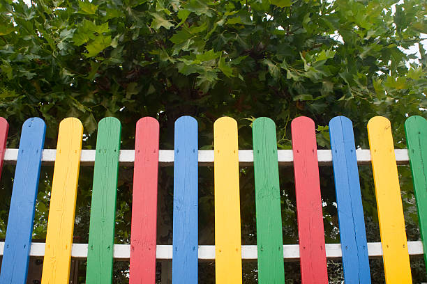istock Multicolored Wooden Fence 186349449