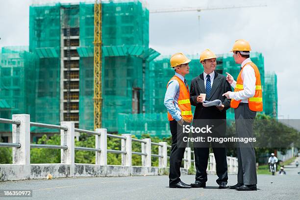 During The Break Stock Photo - Download Image Now - Adult, Architect, Asian and Indian Ethnicities