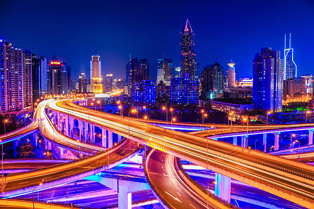 istock beautiful interchange overpass and city skyline 186351798