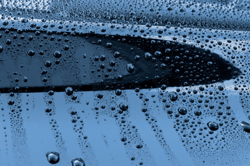 Gotas de agua sobre de pintura de coches, pulido photo