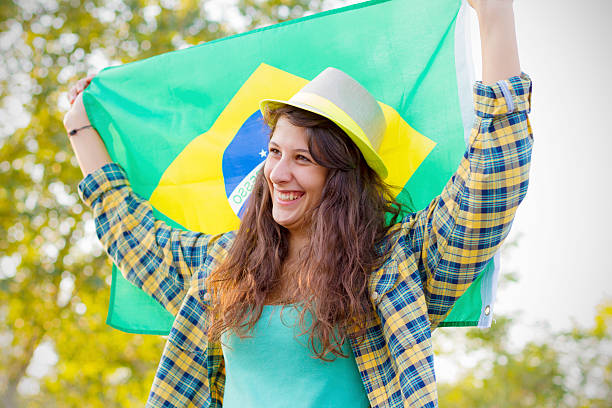 istock Brazilian supporter with flag 186354535
