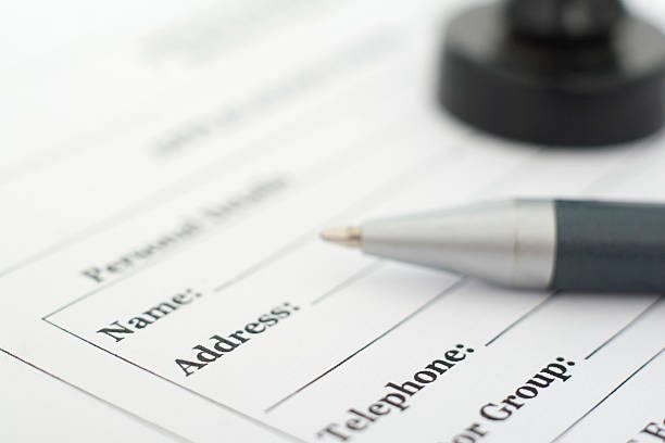 istock form, pen and stamp on the desk 186355438