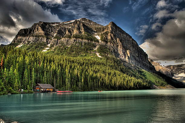 Scenic moutains with lake in HDR, Rocky Mountains, Alberta, Canada stock photo