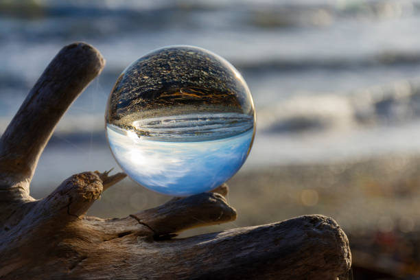 Glass Lens Ball and Ocean View