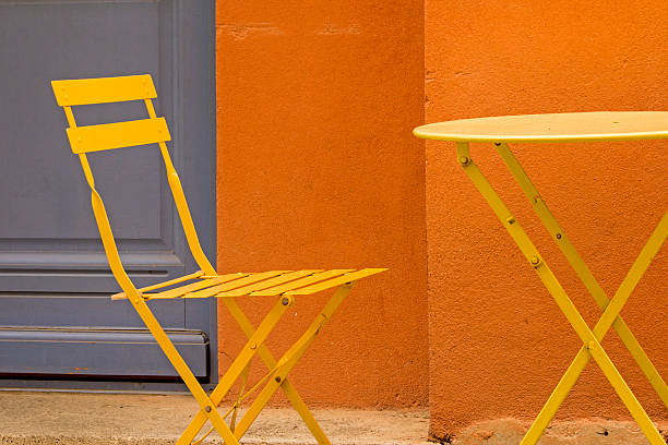 Cosy vintage cafe terrace in a street of Cassis on the French rivieria, France