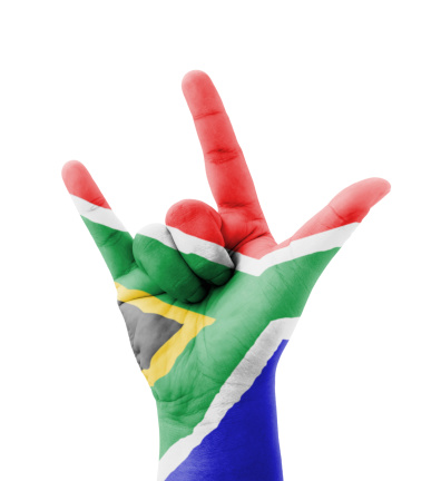 Hand making I love you sign, South Africa flag painted, multi purpose concept - isolated on white background