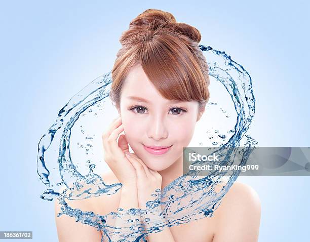 Woman With Fresh Skin In Splashes Of Water Stock Photo - Download Image Now - Asia, Human Face, Splashing