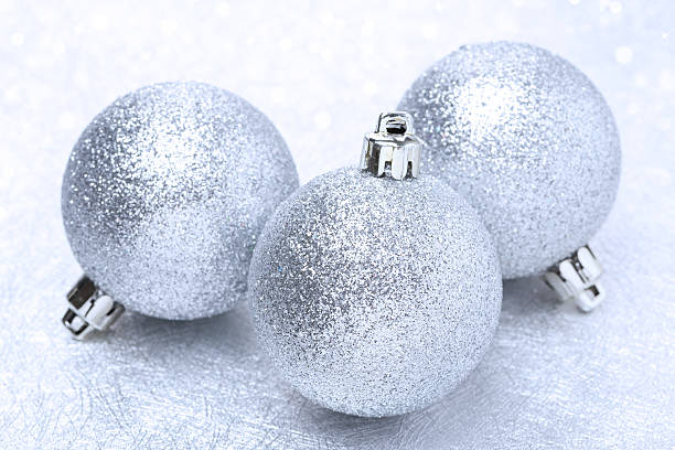 istock shiny christmas balls and bokeh 186365226