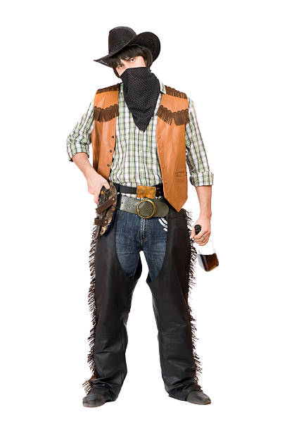 istock Cowboy with a bottle of whiskey 186366726