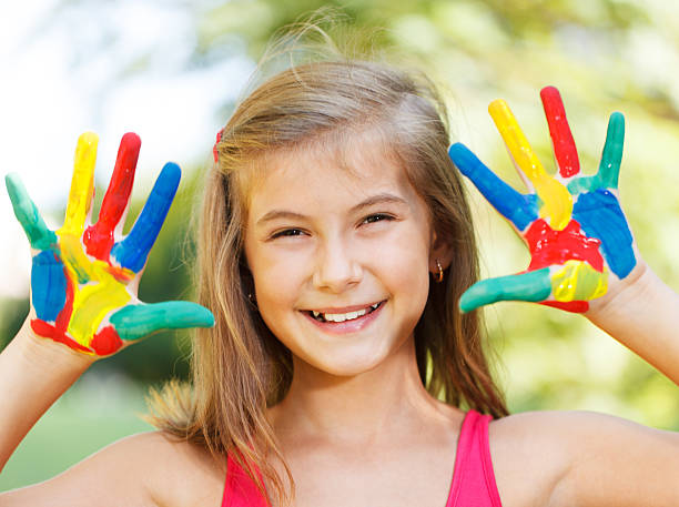 istock Happy girl with painted hands 186367146