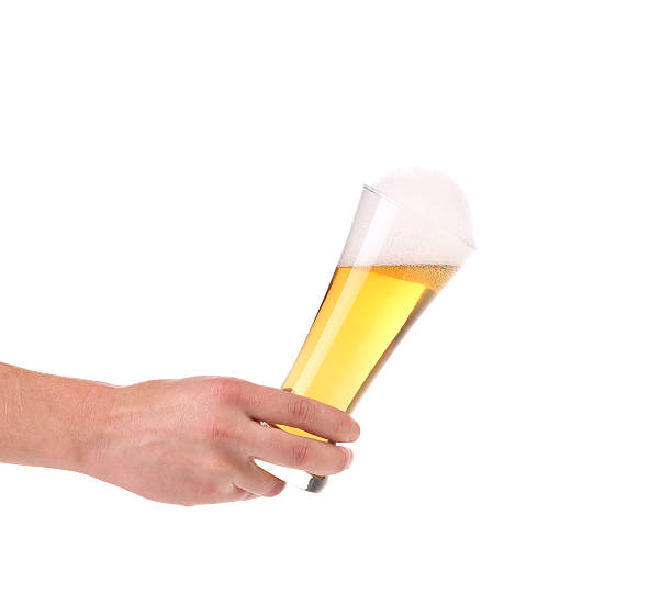 istock Full beer glass in hand. 186368889