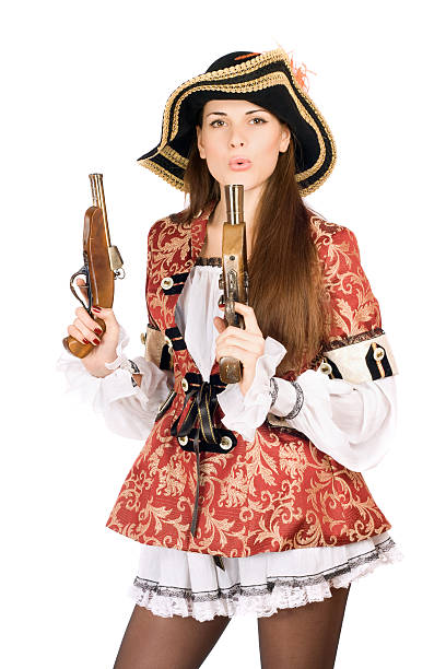 istock pretty woman with guns dressed as pirates 186370490