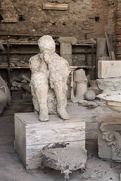 Volcano Victim Pompeii Pompei man with hands covering face before death among antique objects victims the ruins of pompeii stock pictures, royalty-free photos & images