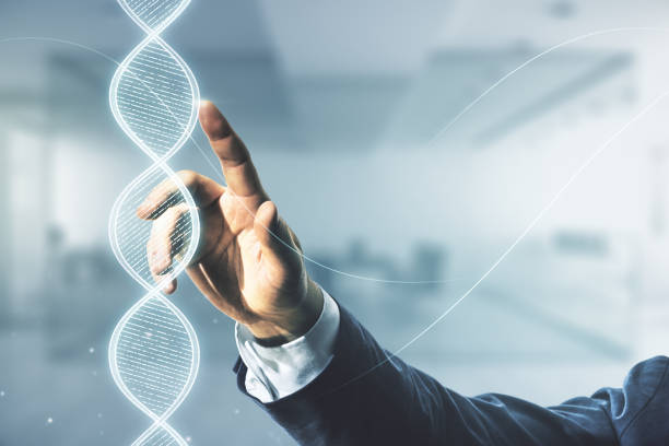 istock Man hand working with virtual DNA symbol illustration on blurred interior background. Genome research concept. Multiexposure 1863724718