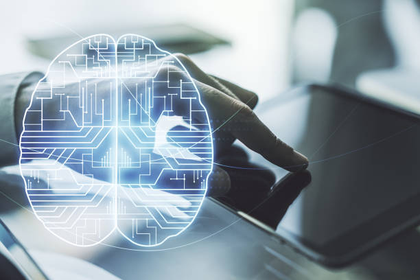 istock Creative artificial Intelligence concept with human brain hologram and finger clicks on a digital tablet on background. Multiexposure 1863724720
