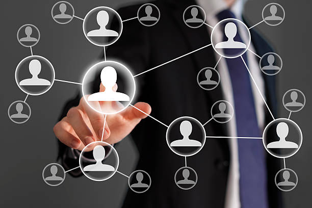 istock A businessman touching a screen with human icon 186372663