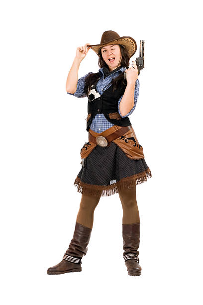 istock Cheerful cowgirl with a gun 186376021