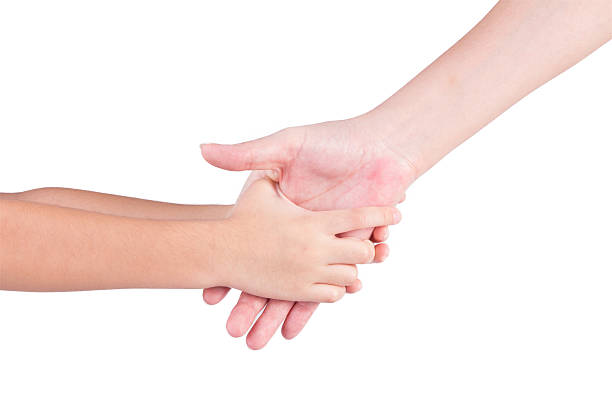 istock Mother holding hands of her son 186377226