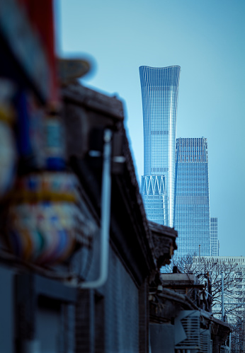 View of modern high tall buildings from hutong valley. Beijing, China