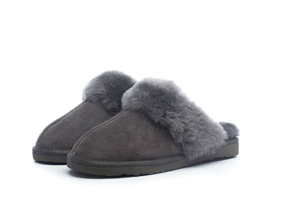 Pair of handcrafted leather slippers with wool lining