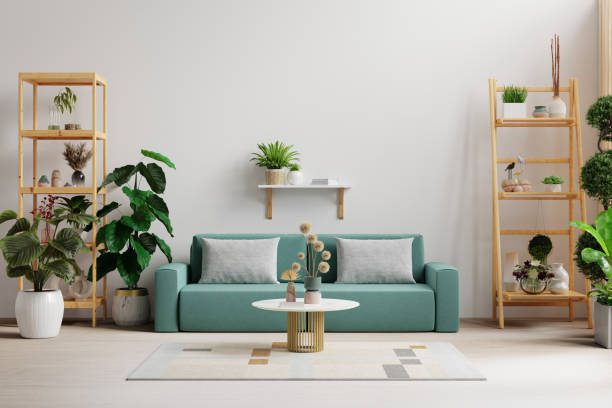 istock Cozy living room with blue sofa and decor on empty white wall background 1863803340