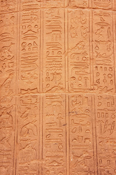 istock Ancient hieroglyphics on the wall of Philae Temple 186380753