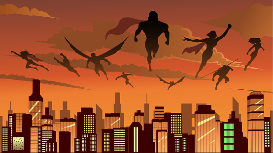 A silhouette illustration of a superhero team flying above a city skyline. Easy to grab and edit.  Wide space available for your copy.