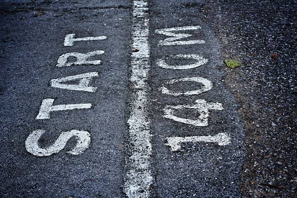 istock asphalt road with  start sign 186381173