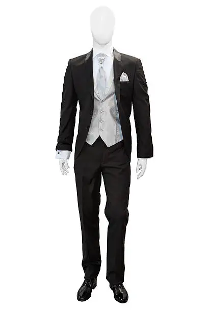 Business dark grey suite on mannequin isolated on white