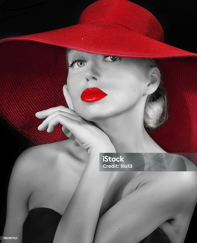 fashionable lady with red lips in hat fashionable lady with red lips in hat . Adult Stock Photo