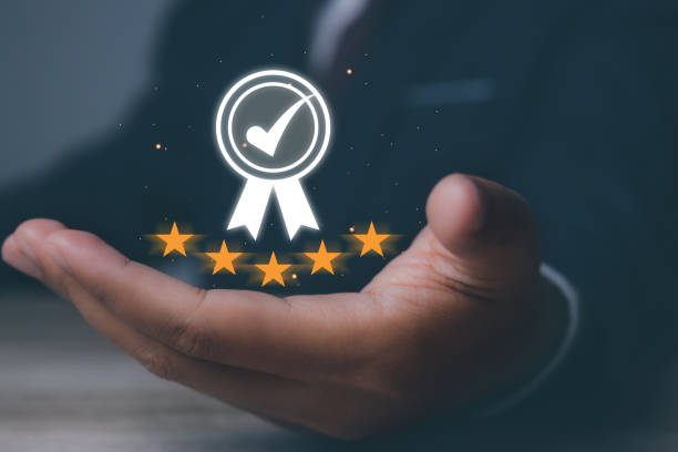 istock Man holding quality assurance, Guarantee, Standards, ISO certification and standardization. Quality management control. conformity to international standards. 1863826767