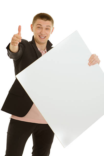 istock Businessman holding blank banner 186391265