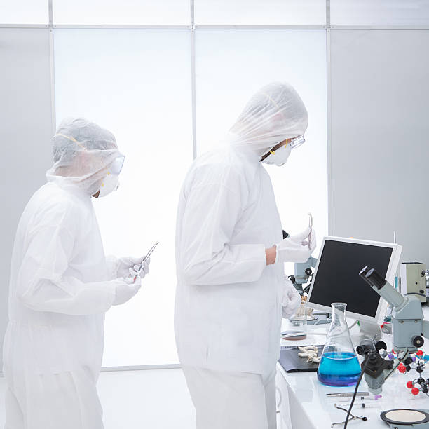 istock people studying in a chemistry lab 186391963