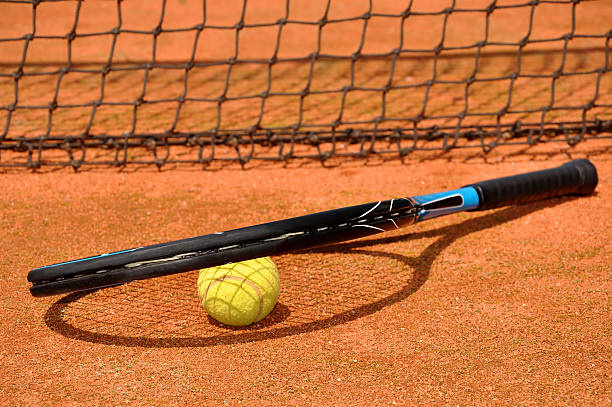 istock Tennis ball and racket 186394724