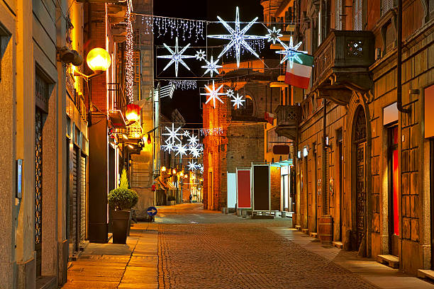 istock Central street at evening. Alba, Italy. 186396359