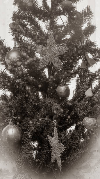 istock Christmas tree with ornaments and snowflakes in black and white 1863987066